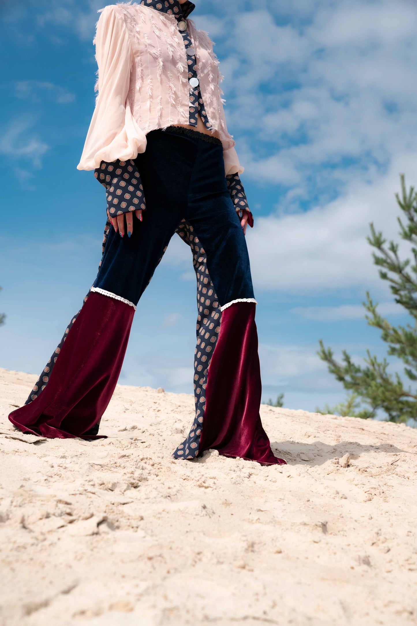 flared trousers with velvet inserts and ornamental patterns