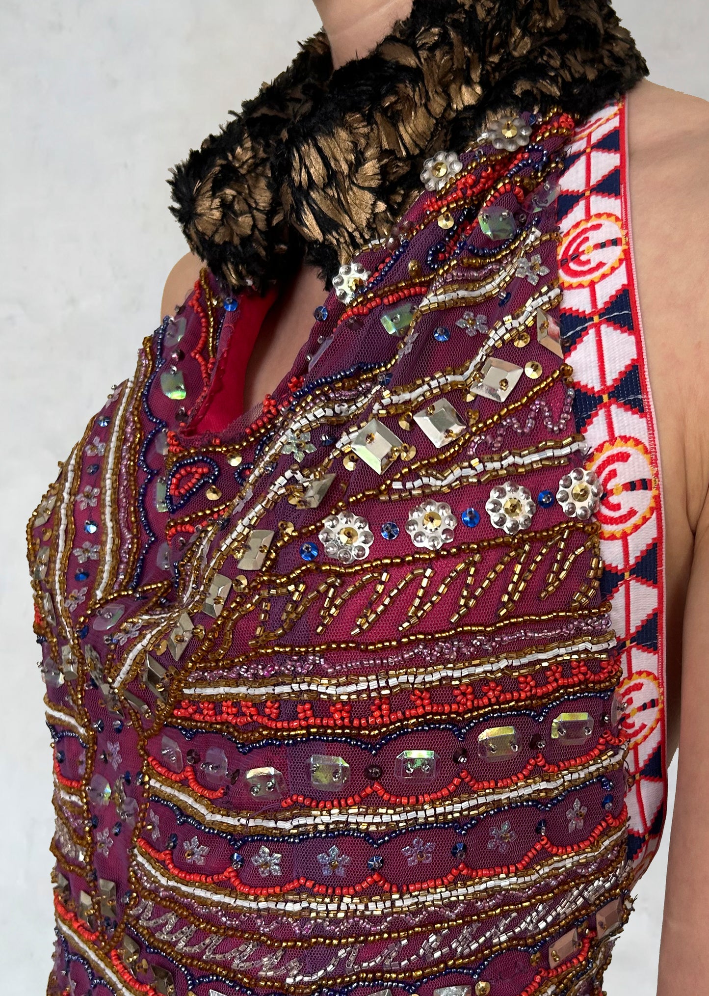 Top with embroidered motifs