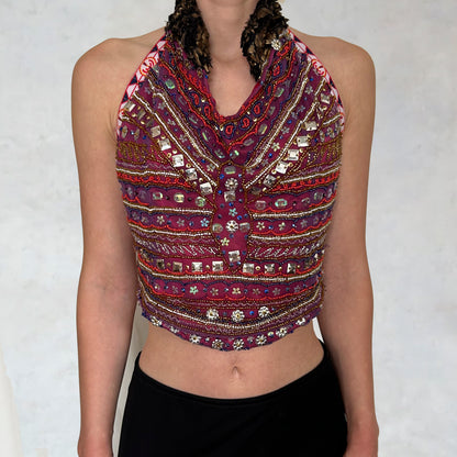 Top with embroidered motifs