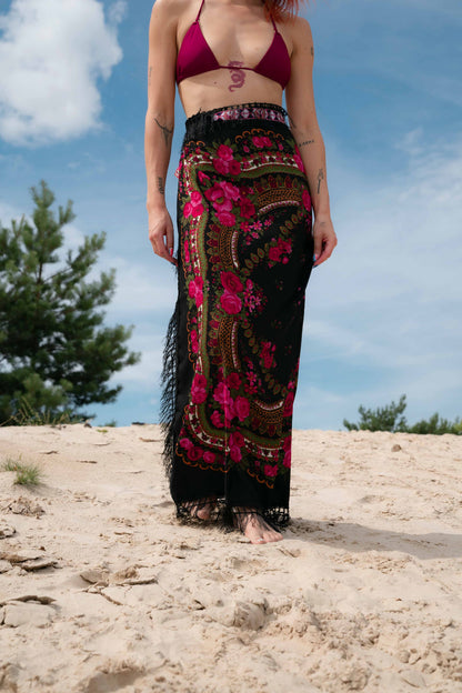 Wrap skirt with floral motifs and fringe