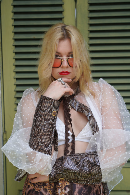 Transparent puff-sleeved blouse with snake print