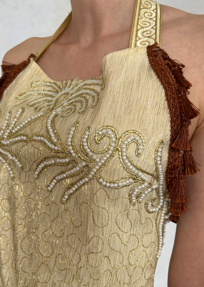 Top with embroidered ornamental motifs